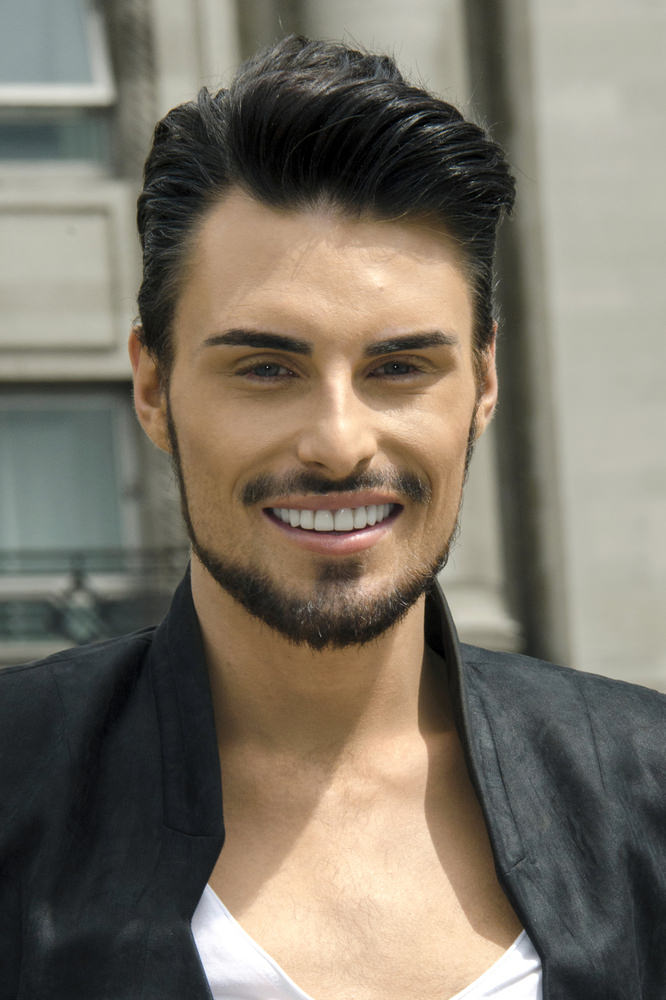 06/12/2013 - Rylan Clark - Rylan Clark "Fur Free and Proud" PETA Photocall at Marble Arch in London on June 12, 2013 - Marble Arch - London, UK - Keywords: black jacket, white shirt, facial hair, beard, mustache, short wavy black hair, Advertisement, England, Capital Cities, Photo Call, Launch Event, Arts Culture and Entertainment, Celebrities, People For The Ethical Treatment of Animals, English singer, presenter, television personality, model, "The X Factor", "Celebrity Big Brother", LMK73-44905-120613 Orientation: Portrait Face Count: 1 - False - Photo Credit: Landmark / PR Photos - Contact (1-866-551-7827) - Portrait Face Count: 1