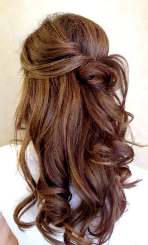 curly prom hairstyle with highlights