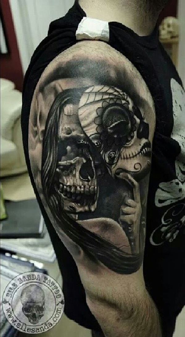64-Skull-with-mask-tattoo-on-sleeve