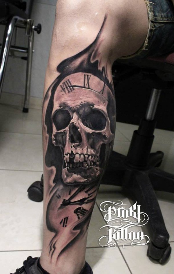 71-Skull-with-watch-tattoo-on-leg-for-men