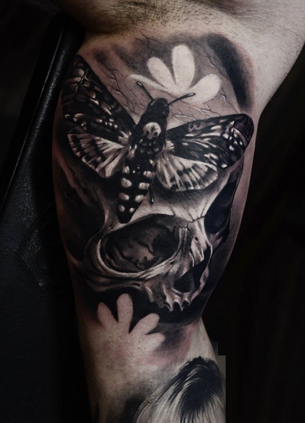 76-Skull-with-moths-tattoo