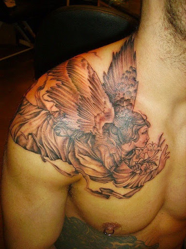 Awesome angel tattoo design on chest