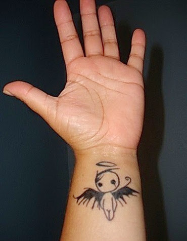 Baby boy angel Tattoo design on wrist