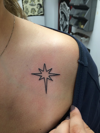 Disney Star tattoo designs on upper chest ideas for women.
