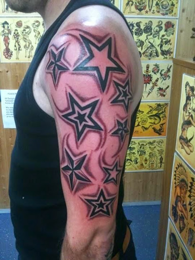Nautical Star tattoo designs on the shoulder and arm ideas for men..