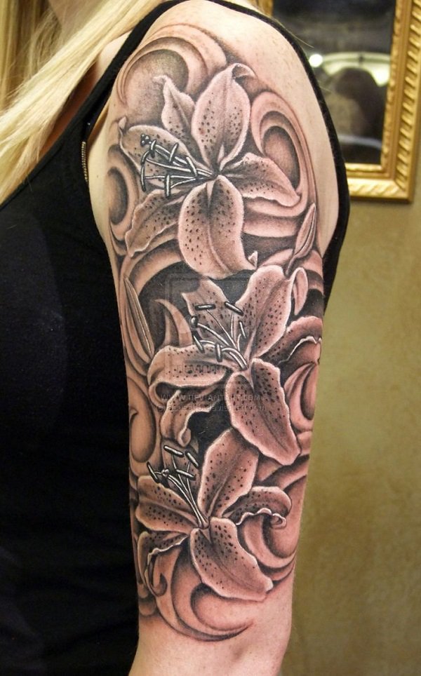 Realistic-black-and-white-lily-tattoo-on-half-sleeve