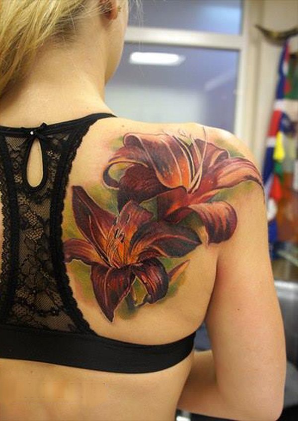 Realistic-lily-Tattoo-on-back-by-Andrey-Grimmy