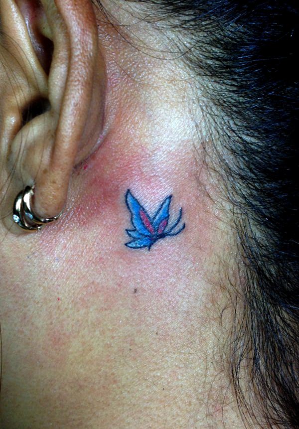 great butterfly neck tattoo design.