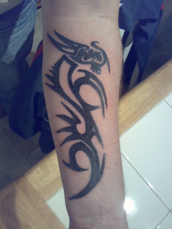 tribal-dragon-symbol-tattoo