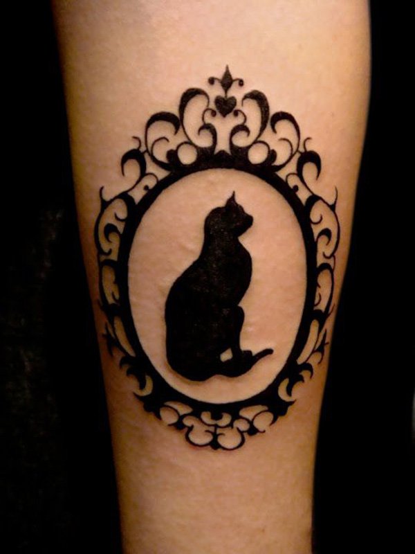 Small cat tattoo