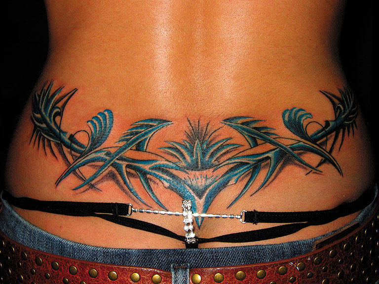 1. Lower Back Tattoos for Women - wide 5